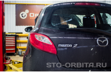 Постгарантийный ремонт Мазда 2 на СТО Орбита